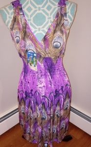 New with tags, soft material, Purple peacock dress.
